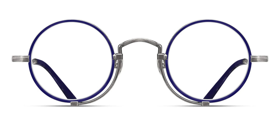 Round eyeglasses with blue frames and prominent silver accents on a white background