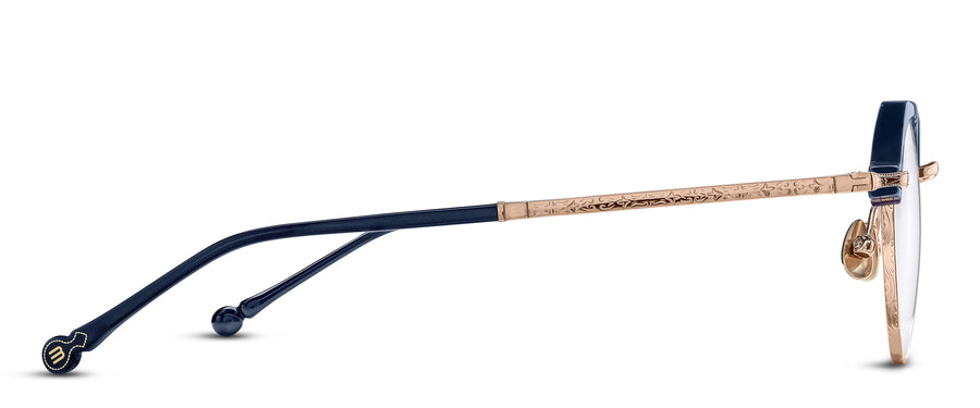 Side profiles of eyeglasses with navy acetate and detailed rose gold metal sides on a white background