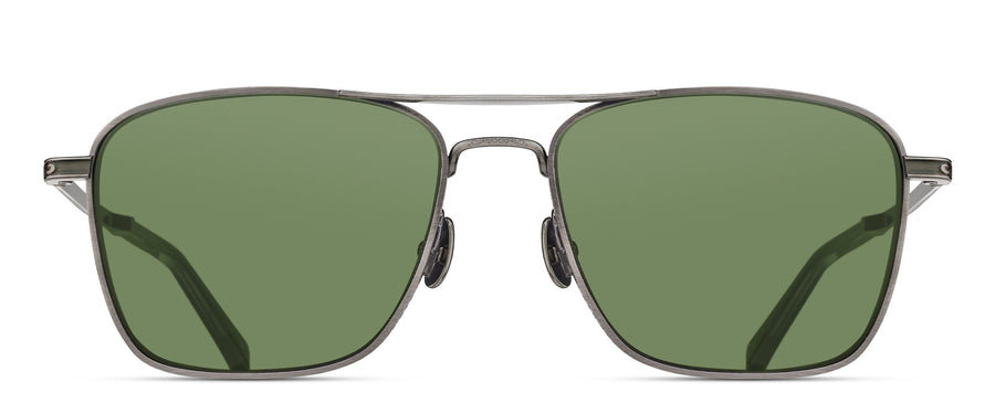 Navigator sunglasses with green lenses and an antique silver frame on a white background