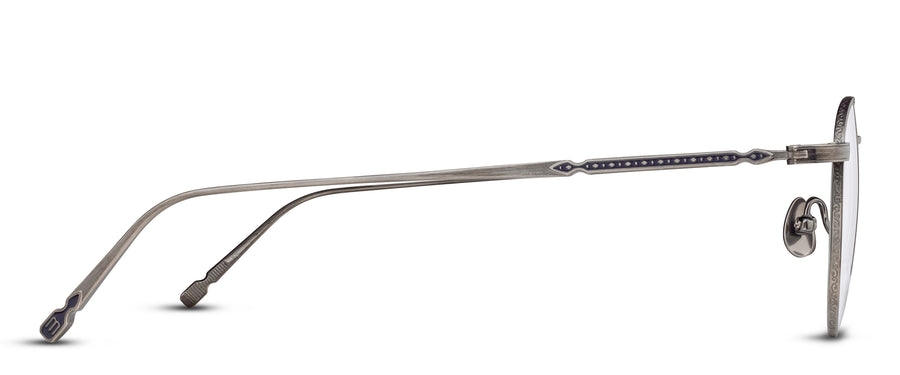 Silver eyeglasses with an ornate thin frame on a white background