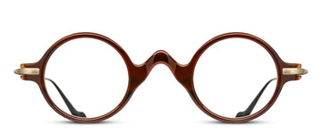 Round eyeglasses with a brown crystal frame with a quirky pointed bridge, on a white background