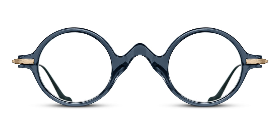 Round eyeglasses with a dark blue crystal frame with a quirky pointed bridge, on a white background