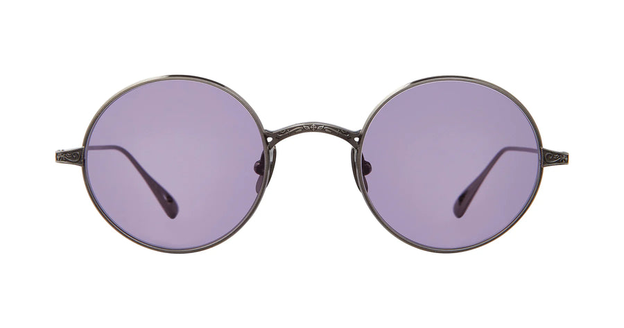 Round metal sunglasses with purple lenses, Ozzy Osbourne inspired with Filagree across bridge. 