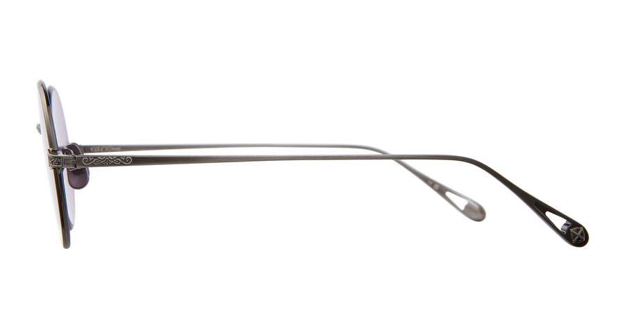 Side profile of a thin metal eyewear frame in a pewter colour with filagree on the temples.