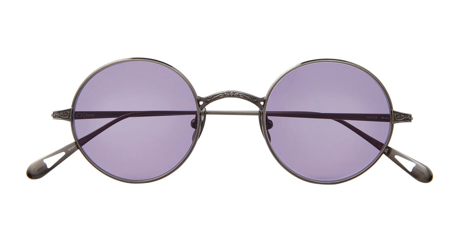 Round metal sunglasses with purple lenses, Ozzy Osbourne inspired with filagree across bridge and temples folded behind the frame.