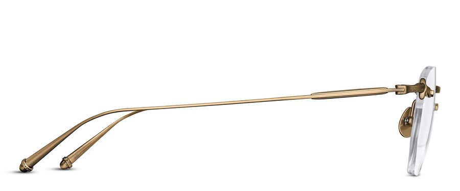 Rimless eyeglasses with a gold frame on a white background